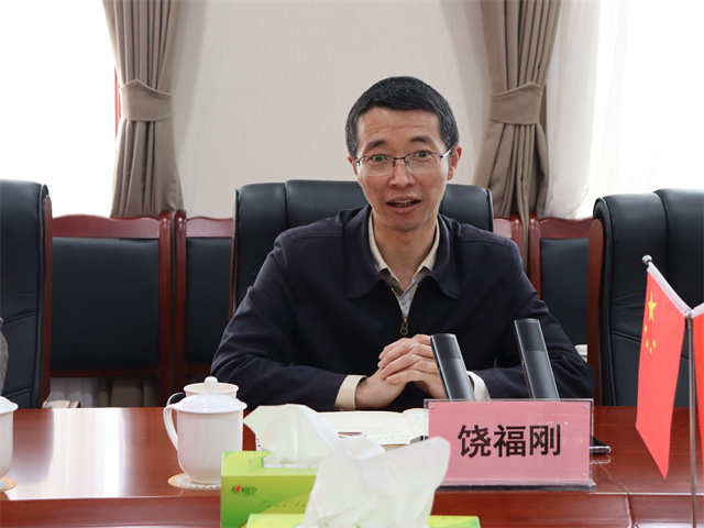鄧華會見宜賓市供銷社黨委書記、理事會主任饒福剛一行
